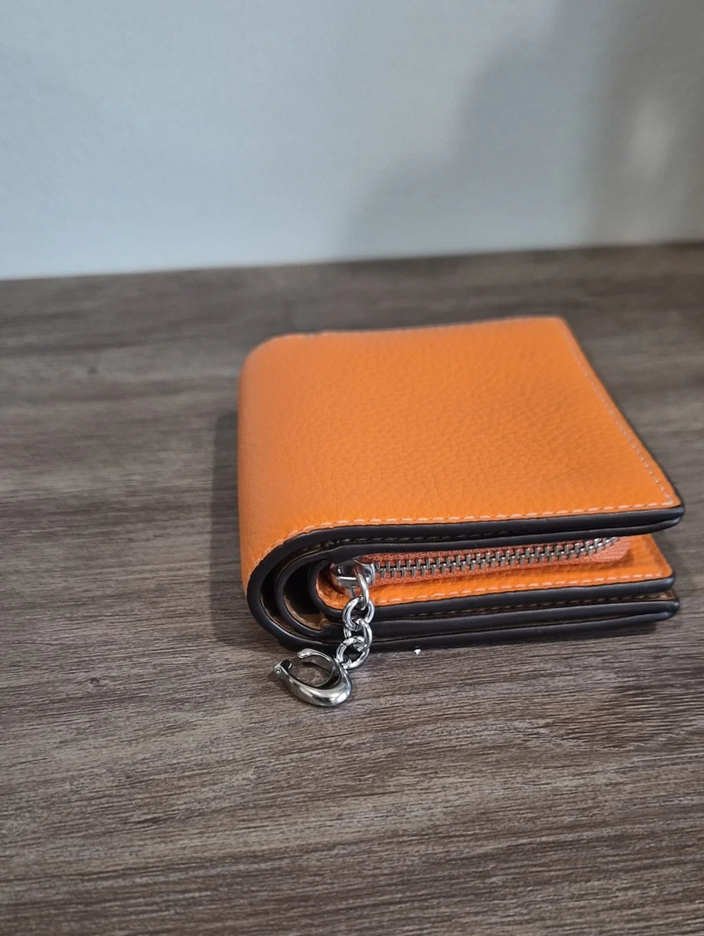 Coach Orange Pebbled Leather Zip Wallet with Silver Logo